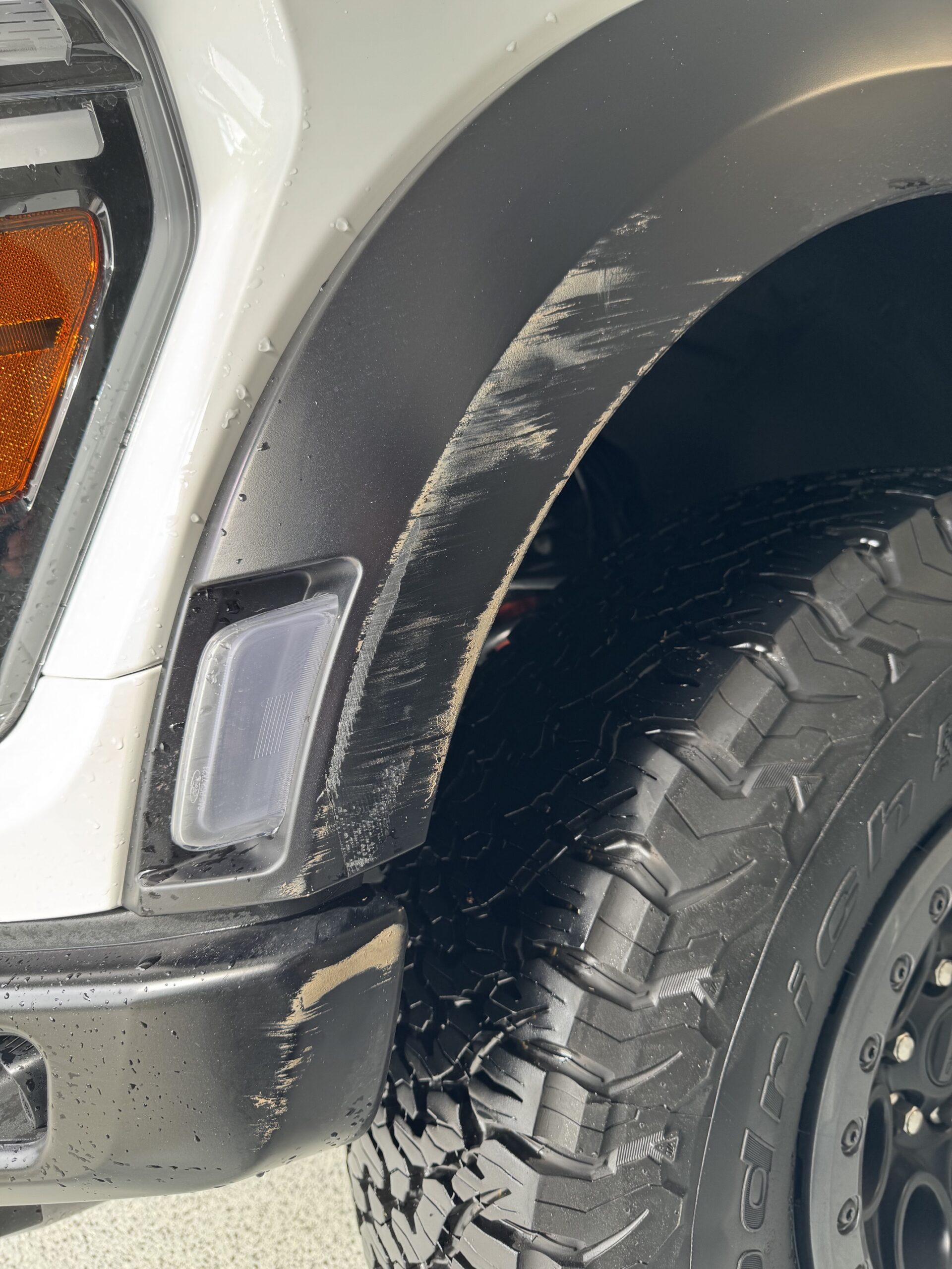 Raptor paint repair fender flare near Missouri City, TX